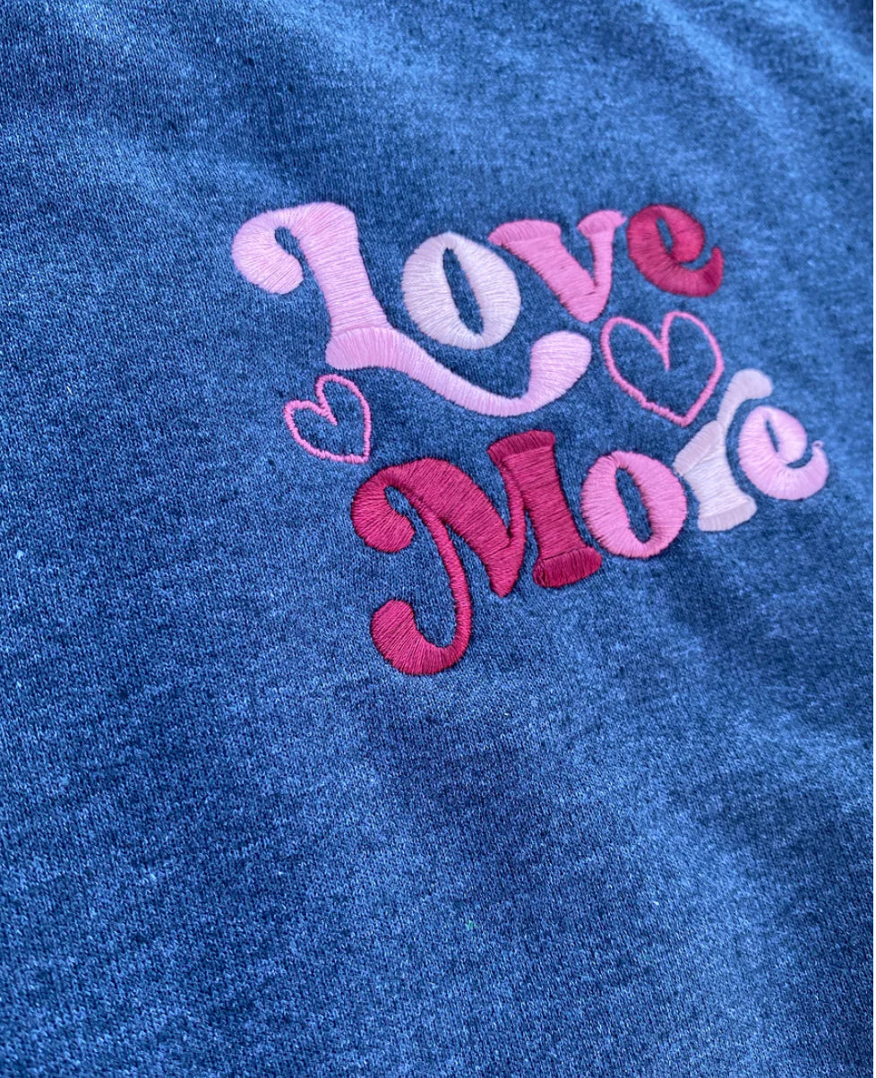 Love More Embroidered Crewneck no