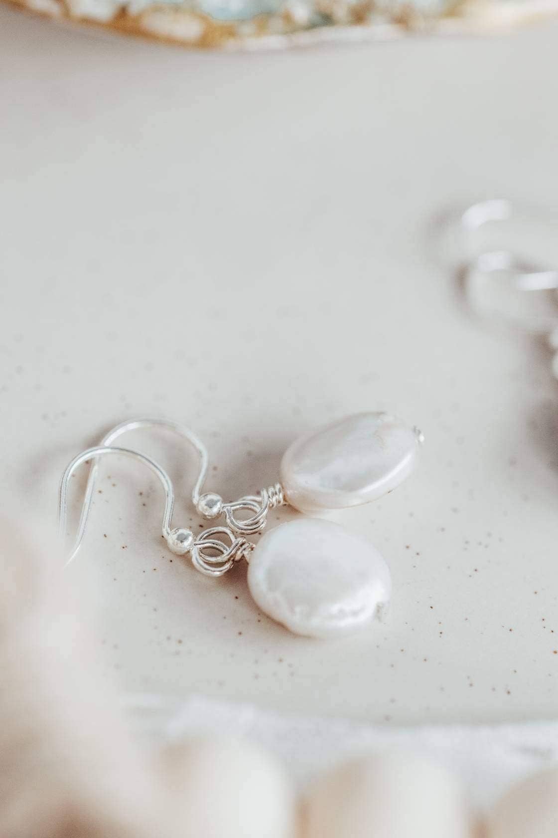 White coin pearl earrings